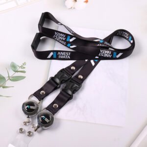 Custom logo heat-transfer lanyard in black with quick-release buckle and round badge reel