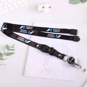 Black promotional neck lanyard with printed branding, detachable buckle, and retractable card holder reel