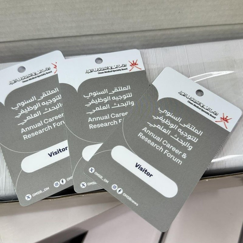 Bulk punched PVC cards with round hole design, custom printed text and logo for staff and visitor badges