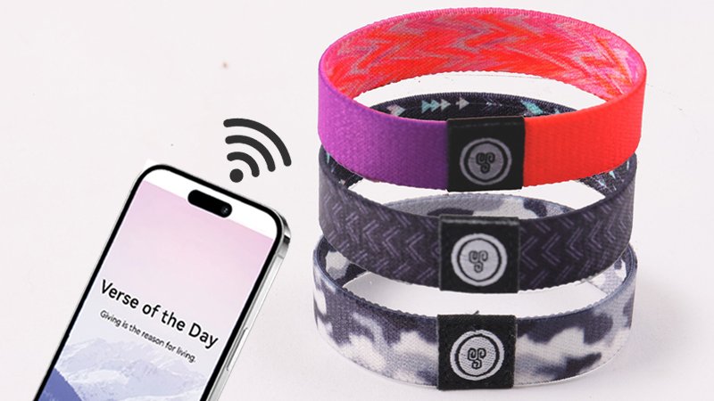 Guest tapping an RFID elastic wristband on a reader for fast entry