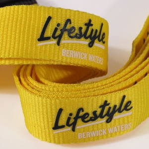 Custom screen print lanyard for ID badges, featuring safety breakaway and detachable buckle for fast scanning