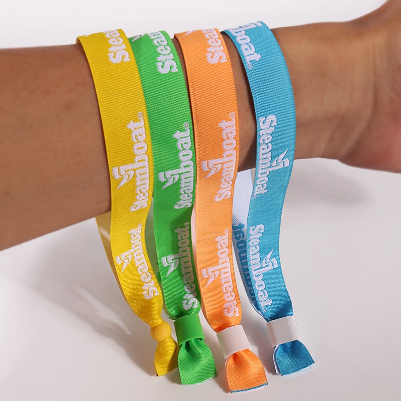 woven wristbands showing role-based text and secure disposable clasp