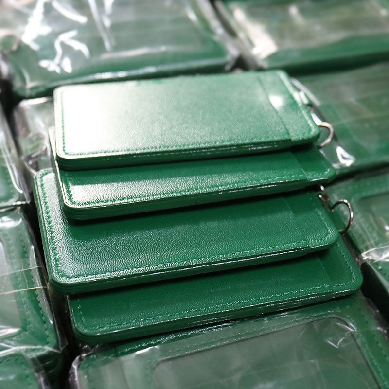 PU leather ID badge sleeve with transparent window film, protects cards and shows information clearly