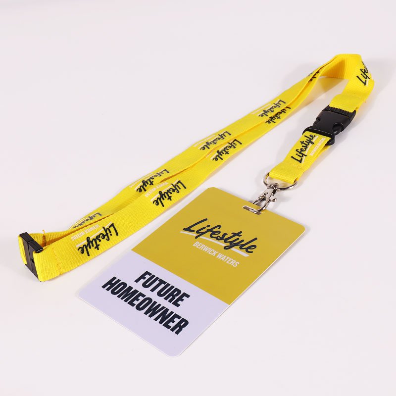 Custom yellow screen printed polyester lanyard with safety breakaway and quick release buckle