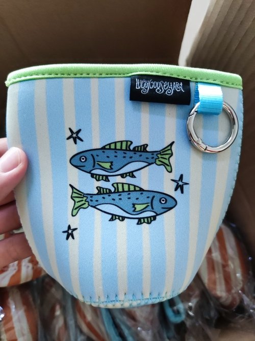 Custom neoprene coffee cup sleeve with woven brand label and metal ring attachment