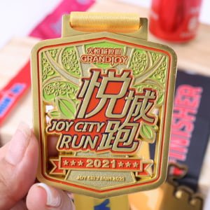 Custom medals and polyester ribbon lanyards set with event name and year branding