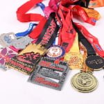 Custom polyester medal ribbon lanyards with printed event logos and sponsor branding