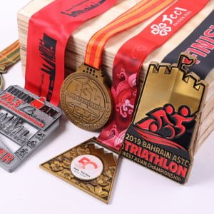 Custom medals and polyester ribbon lanyards set with event name and year branding