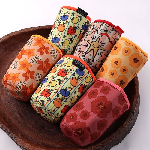 Custom printed neoprene coffee cup sleeves with colorful all-over patterns