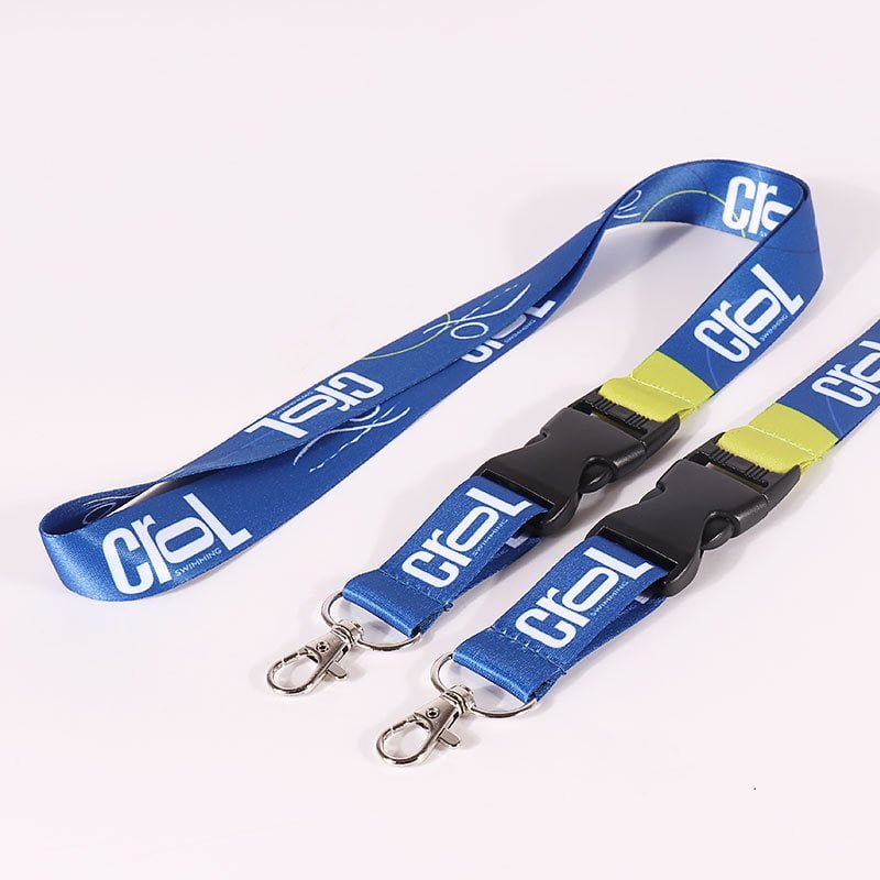 Quick release polyester lanyard with plastic buckle, vibrant printed design and durable webbing for staff credentials