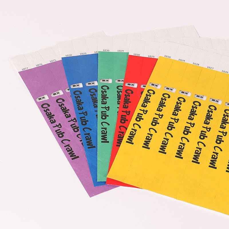 Tyvek wristbands with custom logo and scannable QR codes for festivals and concerts