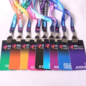 Custom event lanyards with color-coded PVC badges for staff media guests and event teams