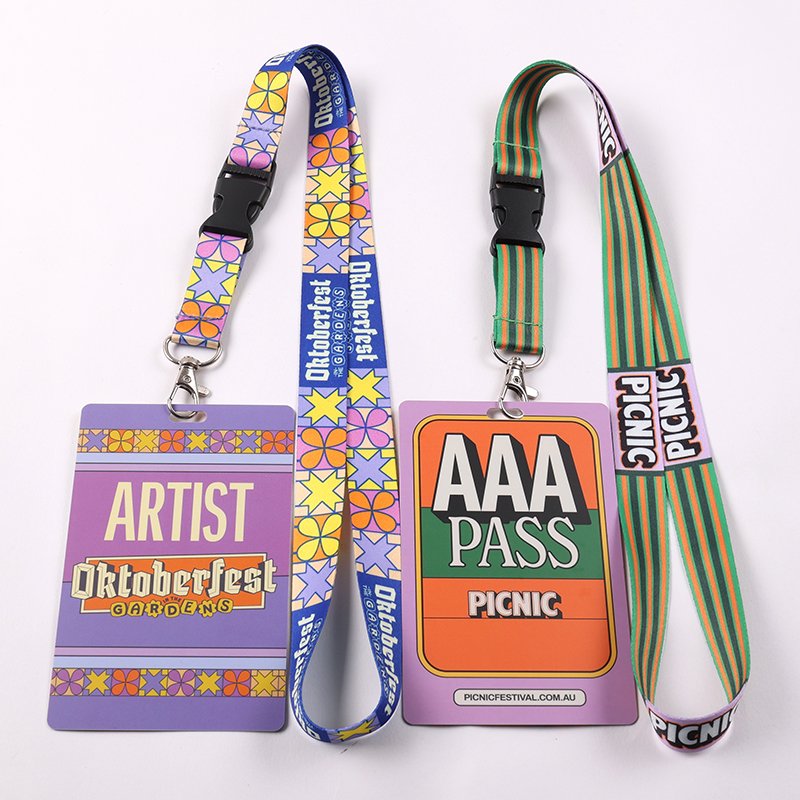 Custom printed event lanyards with colorful PVC badges for festivals conferences and events