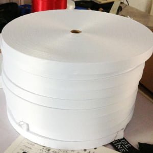 White satin ribbon roll available in multiple widths for packaging and gift wrapping