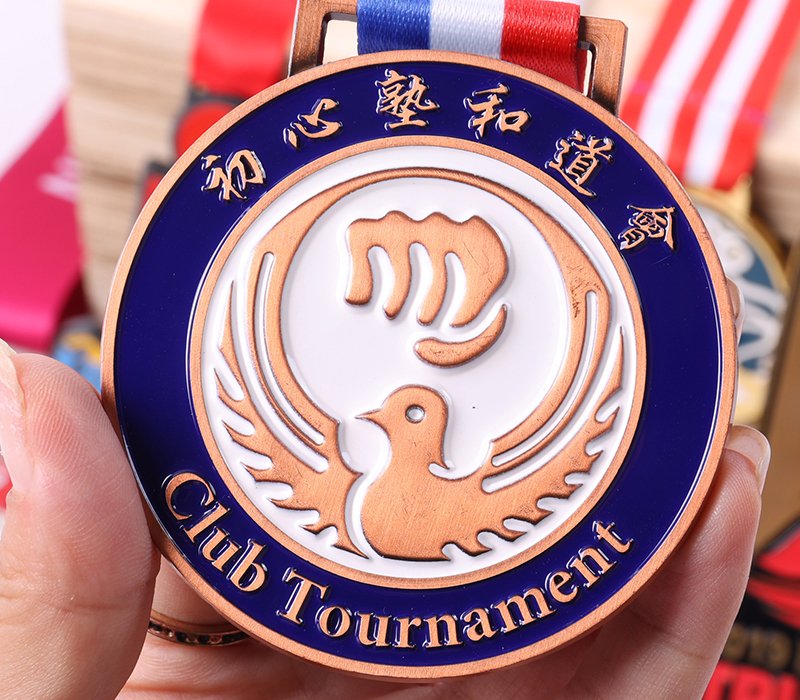 Enamel-filled metal medals with vibrant colors, suitable for corporate promotions and youth sports awards.