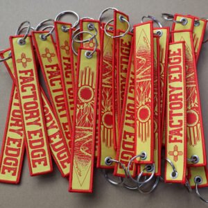 short strap woven label keychains with reinforced metal grommet and ring