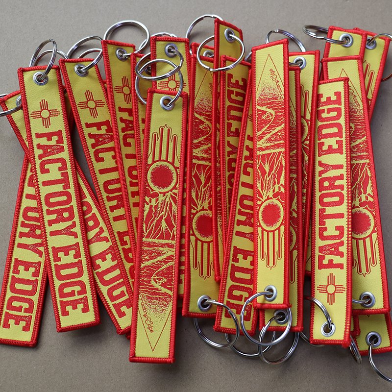short strap woven label keychains with reinforced metal grommet and ring