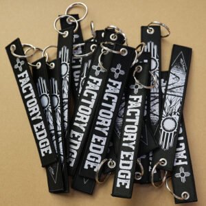 colorful embroidered keychain tags with woven logo branding design