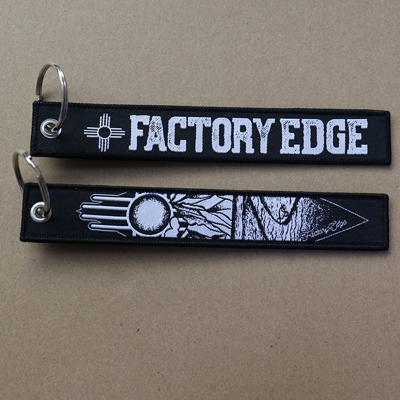 bulk custom woven keychains with embroidery detail and metal key ring