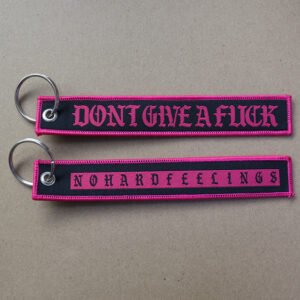 bulk custom woven keychains with embroidery detail and metal key ring