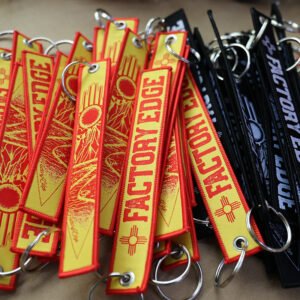 promotional embroidered keychain with reinforced stitching and metal ring