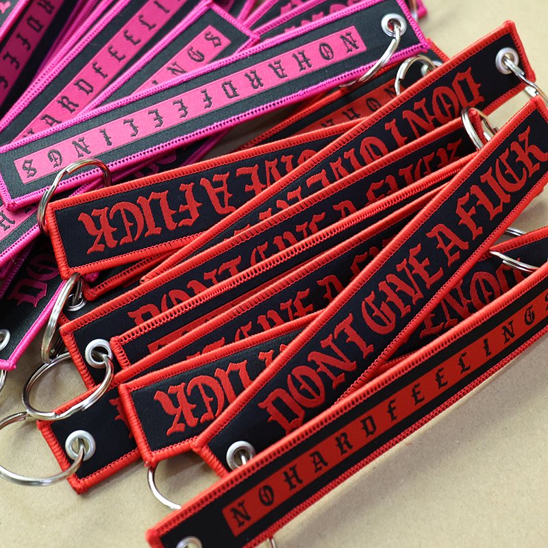 promotional embroidered keychain with reinforced stitching and metal ring