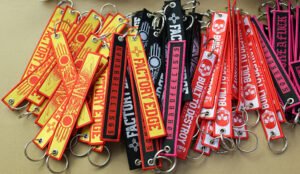 high density polyester embroidered keychain with custom text logo