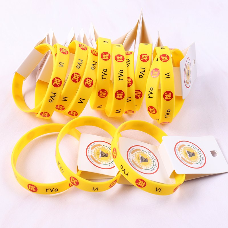Personalized silicone wristbands with heat transfer printing and custom hang tags, perfect for branding
