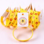 Silicone wristbands with vibrant logo design and product hang tags, available in custom colors and sizes