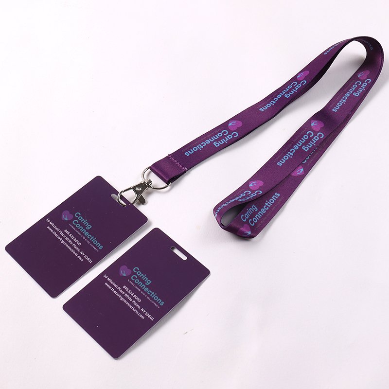 Purple custom printed lanyard with matching PVC event credential cards