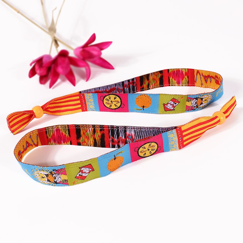 polyester fabric wristband with embroidered text and pattern festival embroidered wristband with adjustable accessory options