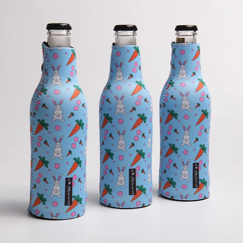 Pink neoprene soft drink bottle sleeve with orange print and oversized ring pull zipper