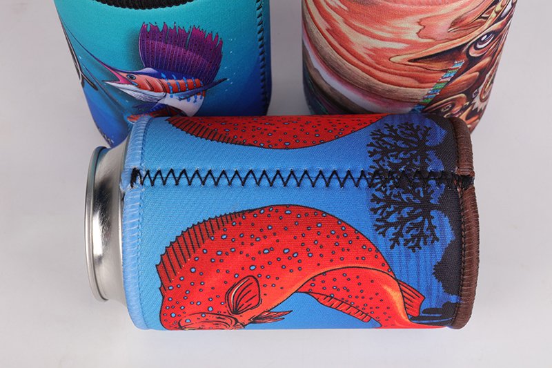 Close-up of 5mm neoprene stubby holder with reinforced stitching and custom printed artwork