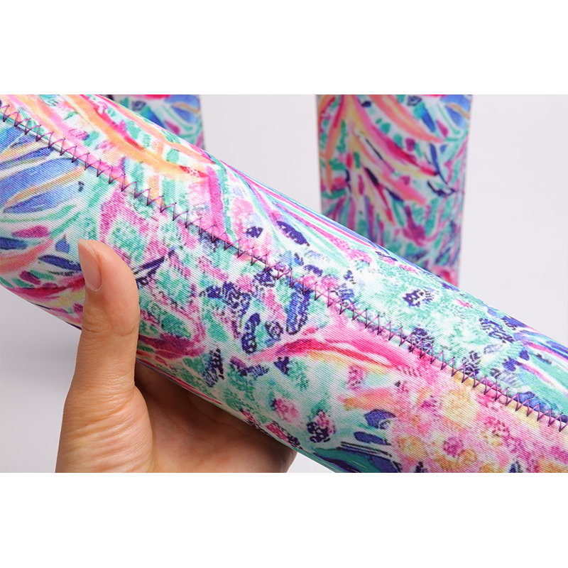 Detailed stitching on thick neoprene wine bottle carrier with full-wrap print