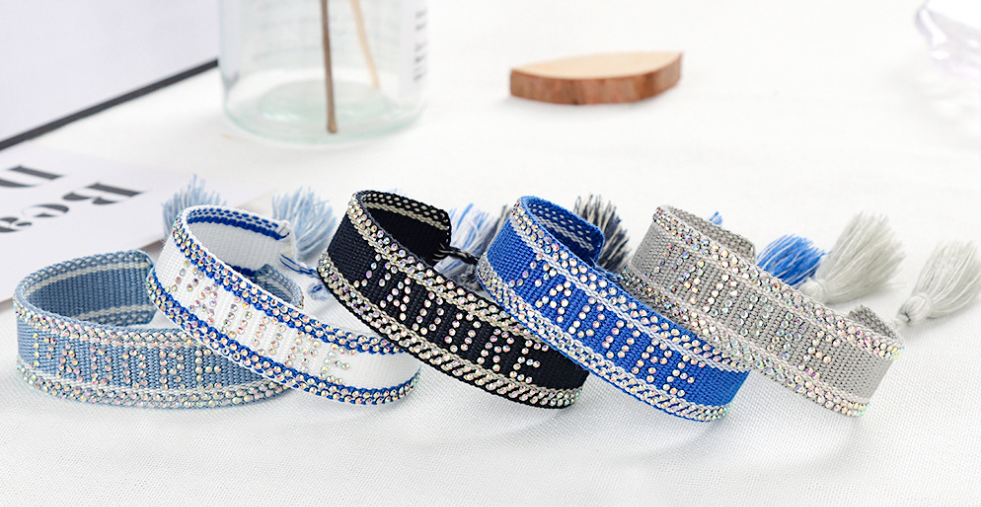 Custom embroidered fashion bracelet decorated with hot-fix rhinestones