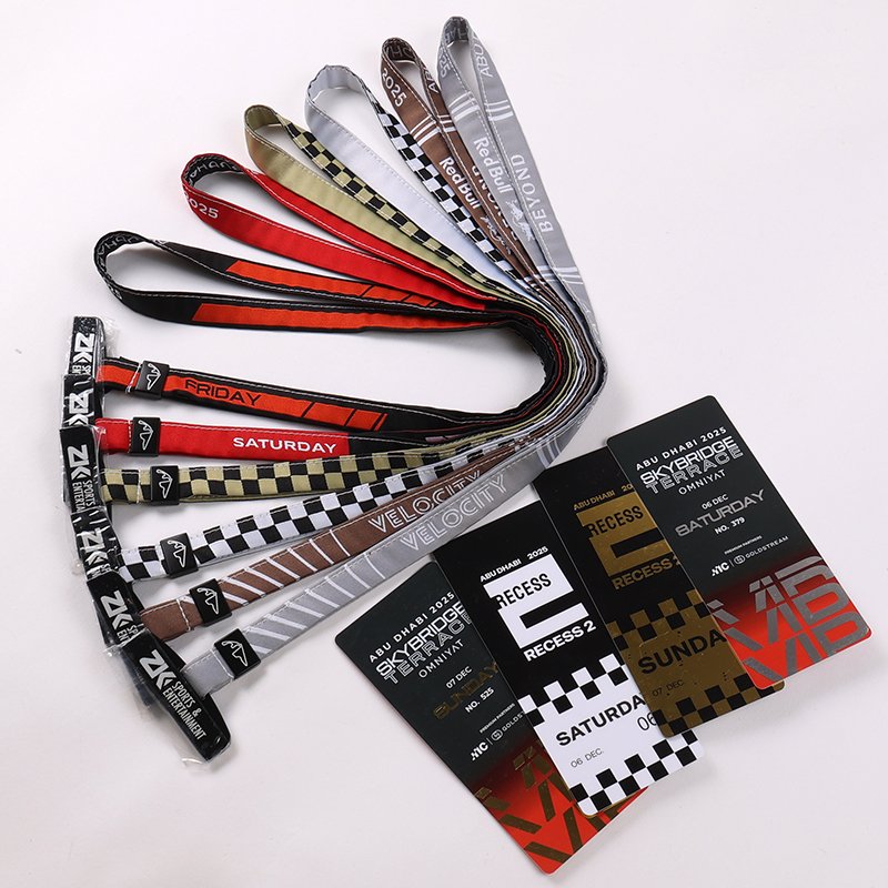 Embroidered racing lanyards with custom PVC cards for F1 motorsport events