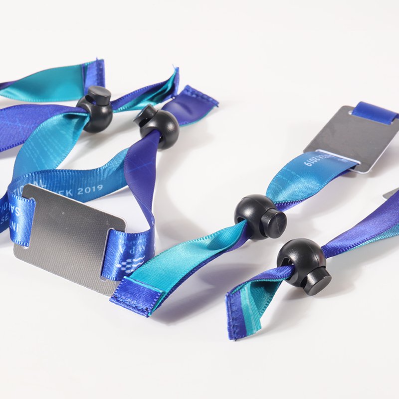 Custom blue RFID fabric wristbands with adjustable security closures