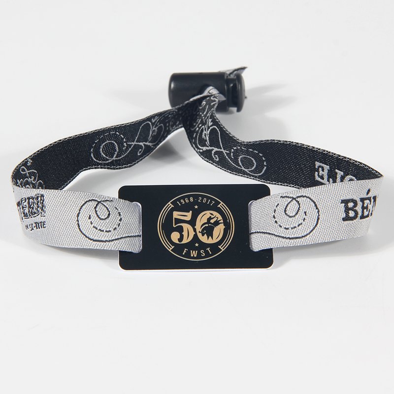 Black and white RFID fabric wristband with custom rectangular RFID tag