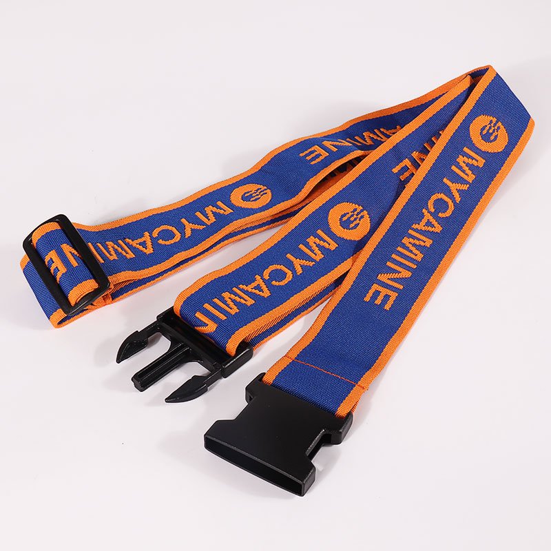 Navy and orange custom luggage strap with repeating logo pattern and buckle