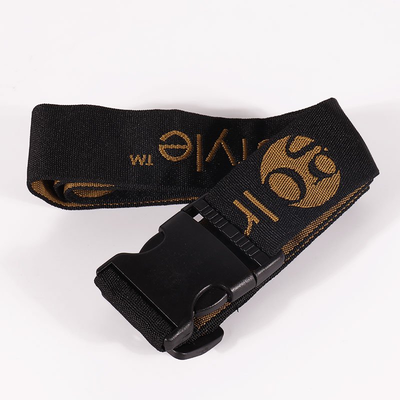Black custom luggage strap with gold logo branding and quick-release buckle