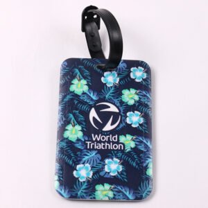 Blue floral personalized luggage tag with white logo and black attachment strap