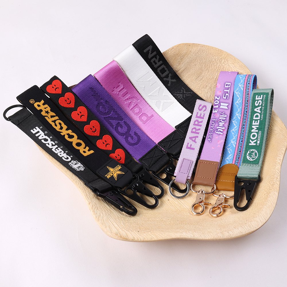 Comparison of polyester, nylon, felt and leather materials for custom key straps and wristlet keychains