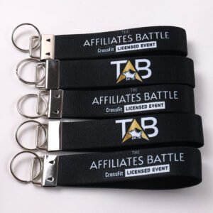 Custom black short key straps with branded logo panels, metal clips and key rings