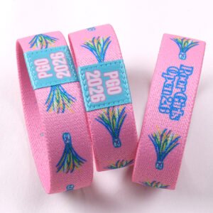 Pink custom NFC elastic wristbands with full-color event artwork