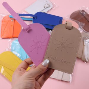 Pastel pink, blue, purple, brown and yellow embossed custom luggage tags