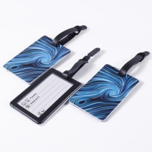 Blue and black digitally printed luggage tags with abstract pattern and ID card window