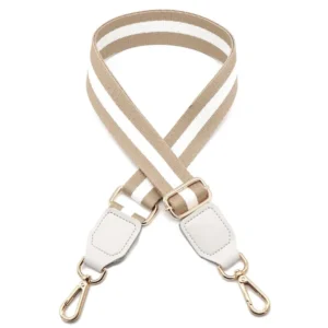 Beige and white striped shoulder strap with white end tabs and gold-colored metal clips
