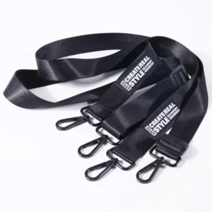 Black shoulder straps with white printed logos, black adjustment sliders and black metal clips