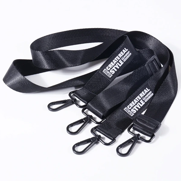 Black shoulder straps with white printed logos, black adjustment sliders and black metal clips