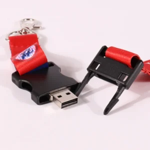 Close-up of a red printed attachment with a black USB buckle, exposed USB plug and separated buckle half